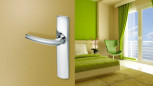 Two door handles with chrome-plated mirror finish, 165 mm apart